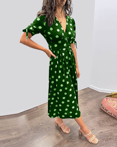 ANKA | Polka dot dress with flared hem and accentuated waist