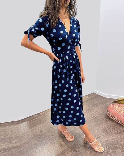 ANKA | Polka dot dress with flared hem and accentuated waist